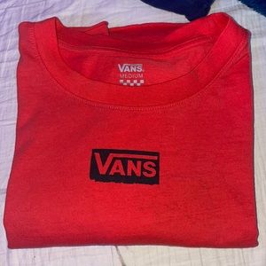 orange long sleeved cropped shirt